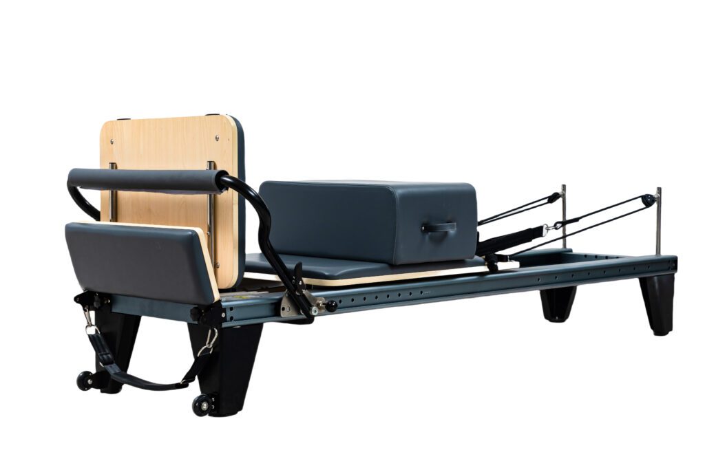Bring the studio experience home with our premium Pilates reformer. This elegant machine, complete with a sturdy wooden box, is engineered for a comprehensive workout. Build lean muscle, enhance your core strength, and enjoy professional-level training in the comfort of your own space.