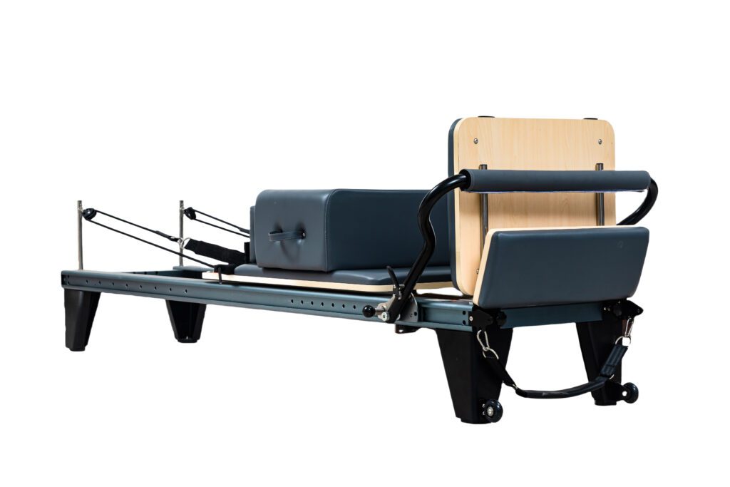 Bring the studio experience home with our premium Pilates reformer. This elegant machine, complete with a sturdy wooden box, is engineered for a comprehensive workout. Build lean muscle, enhance your core strength, and enjoy professional-level training in the comfort of your own space.