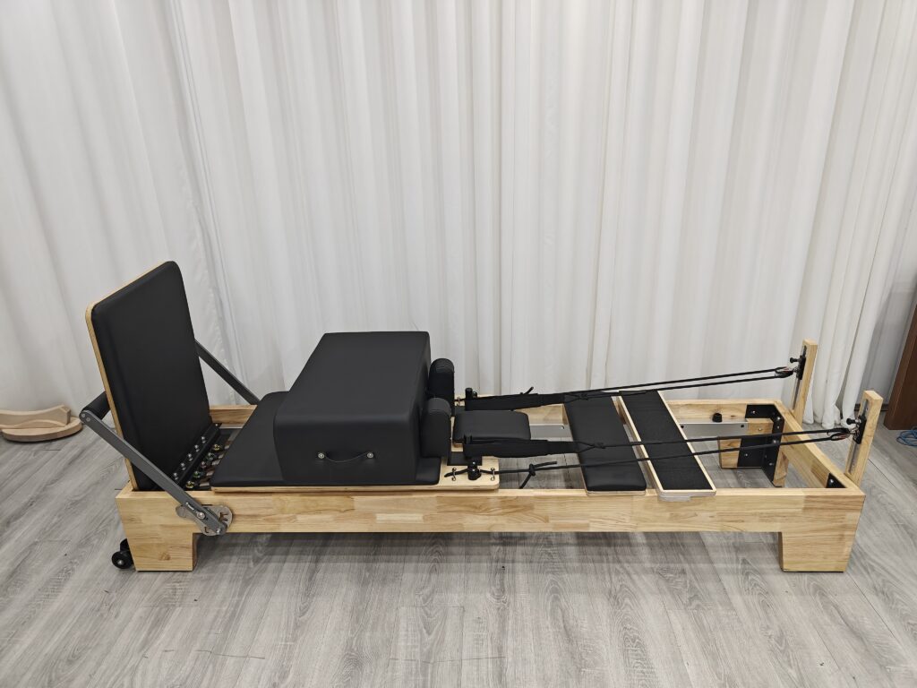 Our foldable Pilates reformer is the ultimate solution for a home fitness studio. Made with high-quality maple wood and a durable PU surface, this portable gym bed offers a professional workout experience that helps you build strength and tone your body with ease.