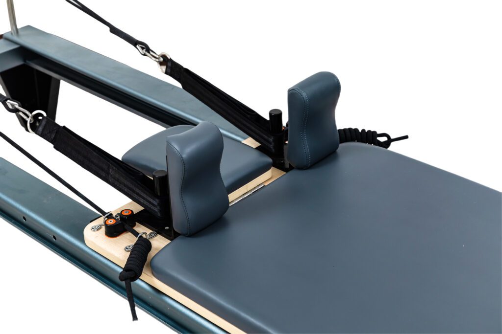Bring the studio experience home with our premium Pilates reformer. This elegant machine, complete with a sturdy wooden box, is engineered for a comprehensive workout. Build lean muscle, enhance your core strength, and enjoy professional-level training in the comfort of your own space.
